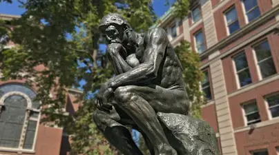 The Thinker statue outside of Philosophy Hall.