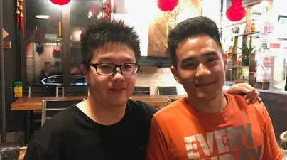 A photo of ALP alum Xiaolin Sun with his language partner Kenneth Taing, an English major at the School of General Studies at the time.